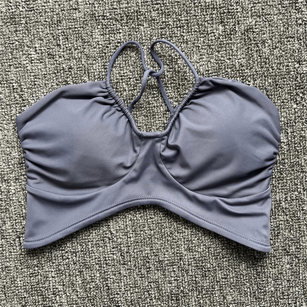 Sexy women's sports bra with open back and deep neckline, in sleek design, perfect for running and activities, SF1773.